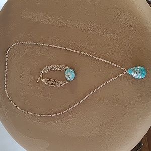 Gold chain necklace and matching bracelet with turquoise stone
